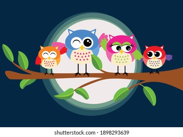 Cute owl family on a branch