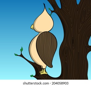 Cute owl on a tree