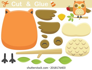 Cute owl on tree branches holding a fruit. Cutout and gluing. Vector cartoon illustration