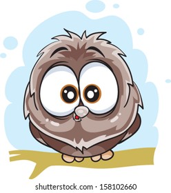 cute owl sitting on the ground