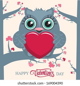 Cute owl sitting on the tree branch and holding a big heart in wings. Valentine's day postcard. Vector illustration. 