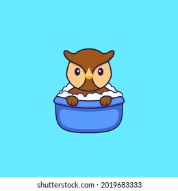 Cute owl taking a bath in the bathtub. Animal cartoon concept isolated. Can used for t-shirt, greeting card, invitation card or mascot.