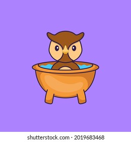 Cute owl taking a bath in the bathtub. Animal cartoon concept isolated. Can used for t-shirt, greeting card, invitation card or mascot.