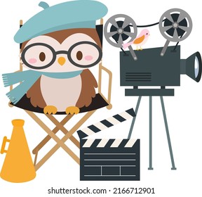 Cute owl waring a barret and glasses  sitting on a movie directors chair with clapboad and camara