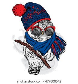 Cute owl wearing a hat and scarf. Vector illustration for greeting card, poster, or print on clothes. Autumn or winter.