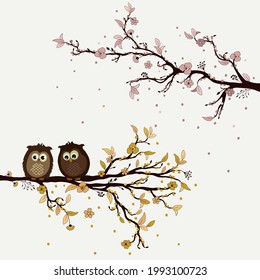 Cute owls on branch in spring on white background