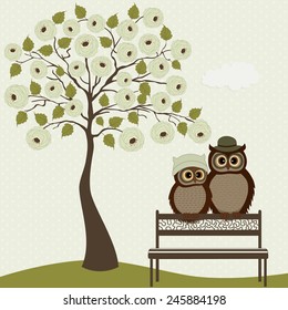 Cute owls with tree roses on a bench