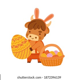 Cute ox holding a large easter egg. Little cow with bunny ears. Kawaii bull and basket of eggs. 2021 zodiac sign. Vector illustration. Cartoon character.