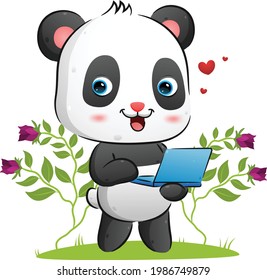 The cute panda is holding a laptop to present something in the garden of the illustration