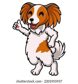 Cute papillon dog cartoon giving thumb up