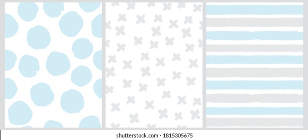 Cute Pastel Color Geometric Seamless Vector Patterns. Blue and Gray Hand Drawn Polka Dots, Crosses and Vertical Stripes on a White Background. Lovely Infantile Irregular Doodle Print.