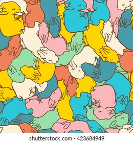 Cute pattern with colorful rabbits. Seamless pattern can be used for wallpapers, pattern fills, web page backgrounds, surface textures, textiles.