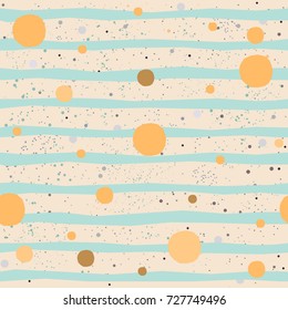 Cute Pattern with Golden balls with pastel blue stripes on beige background with tiny dots. Hand Drawn Design. Great for wall art design, gift paper, wrapping, fabric, textile, etc.
