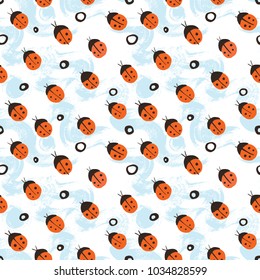 Cute pattern with ladybirds on a celestial background.
