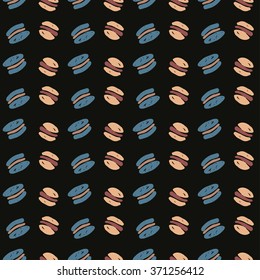Cute pattern with macaroon (French confection of egg whites, icing sugar, granulated sugar, ground almonds and food coloring) 