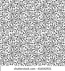Cute pattern in small black flowers. White background. Black and white texture.