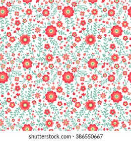 Cute pattern in small flower. Small colorful  flowers. Blue background. Floral seamless pattern. 