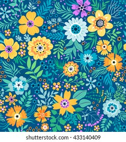 Cute pattern in small flower. Small colorful flowers. Dark blue background. Folk floral background. The elegant the template for fashion prints.
