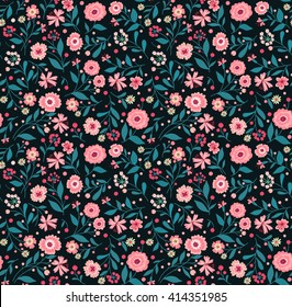 Cute pattern in small flower. Small pink flowers. Black background. Spring floral background. The elegant the template for fashion prints.
