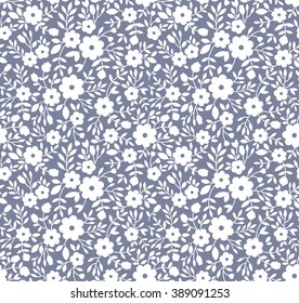 Cute pattern in small flower. Small white flowers. Gray background. Floral seamless pattern. Small cute simple spring flowers. 