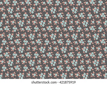 Cute pattern in small flower. Small white flowers. Dark gray background. Spring floral background. The elegant the template for fashion prints.