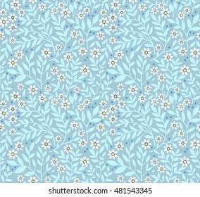Cute pattern in small flower. Small white flowers. Light  blue background. Ditsy floral background. The elegant the template for fashion prints.  Vector seamless floral pattern.
