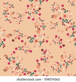 Cute pattern in small flowers. Floral seamless background for textile, wallpapers, wrapping, paper. Pink.