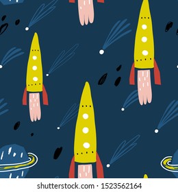 Cute pattern with yellow rocket. Seamless vector texture for baby design.