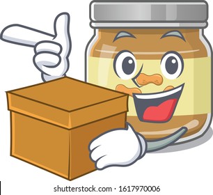 Cute peanut butter cartoon character having a box