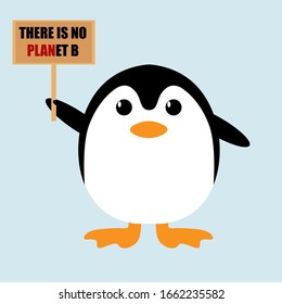 Un pingüino chiquito sostiene un cartel para protestar contra el cambio climático