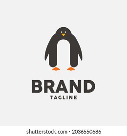 Cute Penguin and Lowercase Letter n Logo