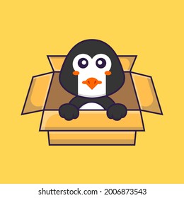 Cute penguin Playing In Box. Animal cartoon concept isolated. Can used for t-shirt, greeting card, invitation card or mascot.