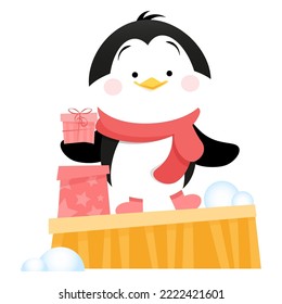 A cute penguin stands on a box with a gift and holds a gift in his hand