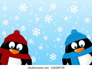 Cute penguins on winter background