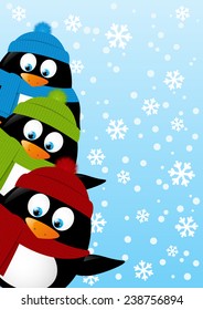 Cute penguins on winter background