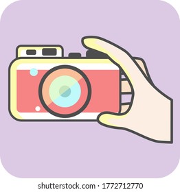 cute photo camera Vector illustration. hand with camera photographic device isolated icon vector illustration design.