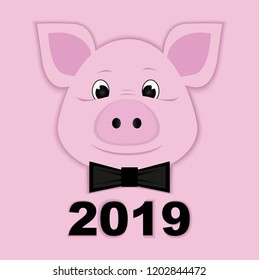 a cute pig of pink paper, a bow tie with a paper symbol 2019