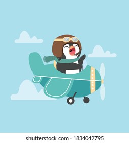 Cute pilot penguin flying plane cartoon