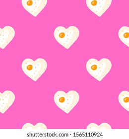 Cute pink seamless pattern with doodle heart shaped fried eggs. Perfect for Valentine's day design and children's clothes.