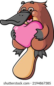 The cute platypus is holding the love pillow for valentine gift of illustration