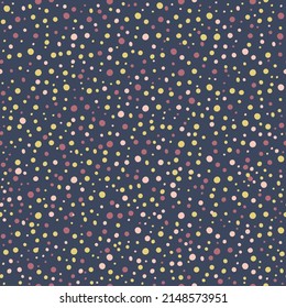 Cute polka dots seamless vector pattern background. Random painted pink, gold, yellow dot shapes on navy blue background. Dense circle confetti texture. Graphic style design element. All over print