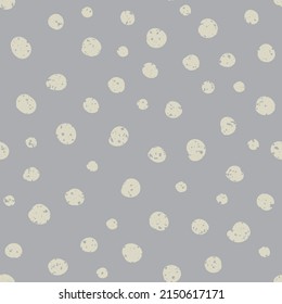 El polka cúbico tiene un fondo de patrón vectorial sin fisuras. El fondo de las formas de punto con textura de color gris pintado. Textura de confeti de círculo aleatorio disperso. Repetición del elemento de diseño de estilo gráfico neutro