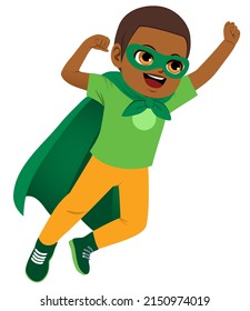 Cute powerful little boy dressed with super hero costume isolated on white background.