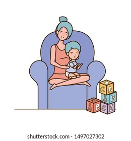 cute pregnancy mother with little boy seated in sofa