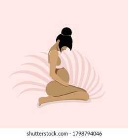 Cute pregnant woman on background of white leaves.