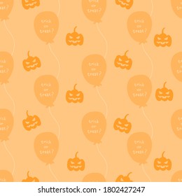 Cute pumpkin and balloon seamless pattern on orange background for Halloween 