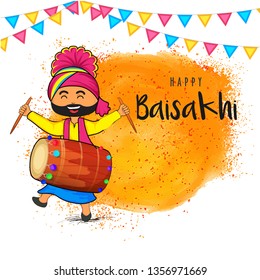 Cute punjabi man dancing while playing drum,  Baisakhi celebration concept.