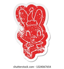 bonitinho peculiar desenho animado afligido adesivo de um coelho dançando vestindo chapéu de santa