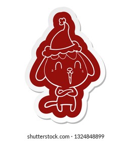 cute quirky cartoon  sticker of a dog wearing santa hat