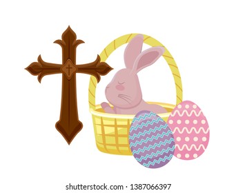 cute rabbit in basket wicker with catholic cross and eggs of easter